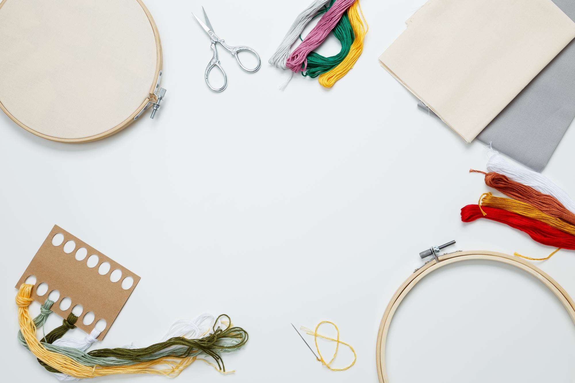 studio table with threads and hoops